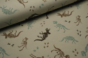 Baumwolljersey Dinos Dinosaurier Skelette beige
