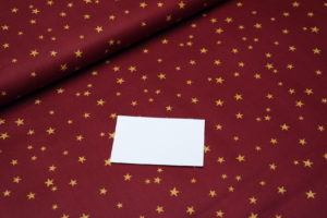 Baumwolle Webware Swafing Weihnachten Sterne gold Druck auf bourdeaux