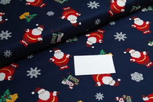 Baumwolle Webware Weihnachten Weihnachtsmänner auf blau