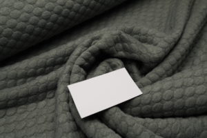 Jacquard Jersey Tupfen oliv grau