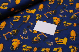 Baumwolljersey Baustelle Baufahrzeuge Bagger auf blau